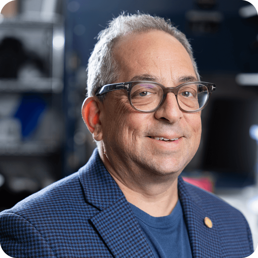 Photography of men wearing glasses and dark blue suit